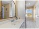 Bathroom featuring a vanity, decorative mirror, storage and natural light at 1008 Hoodtown Rd, Bonneau, SC 29431