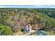 A beautiful home from an aerial view, tucked away amongst the trees at 1014 Bradbury Ln, Charleston, SC 29492