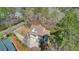 Aerial view of home with attached garage, wrap-around porch, and mature landscaping at 1014 Bradbury Ln, Charleston, SC 29492