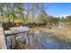 Dock featuring a boat, providing easy access to the water and enhancing the waterfront lifestyle at 1014 Bradbury Ln, Charleston, SC 29492