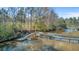Aerial view of the boat dock, featuring paddle boards and easy access to scenic waters for recreation at 1014 Bradbury Ln, Charleston, SC 29492