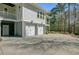 Spacious three-car garage with ample parking space and easy access to backyard at 1014 Bradbury Ln, Charleston, SC 29492