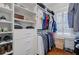 Organized walk-in closet with custom shelving and hanging rods, providing ample storage space at 1014 Bradbury Ln, Charleston, SC 29492