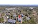 An aerial view of the property within a neighborhood featuring a community pool and landscaping at 1025 Riverland Woods Pl # 609, Charleston, SC 29412
