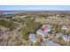 An aerial view of the property surrounded by lush trees with ample parking at 1025 Riverland Woods Pl # 609, Charleston, SC 29412
