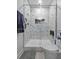 Modern bathroom showcasing a stand up shower with niche, bench and gorgeous tile work at 1025 Riverland Woods Pl # 609, Charleston, SC 29412