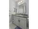 Bathroom vanity features custom countertop, modern faucet and sink, and matte black hardware at 1025 Riverland Woods Pl # 609, Charleston, SC 29412