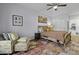 Comfortable bedroom featuring a ceiling fan, neutral color palette and lots of natural light at 1025 Riverland Woods Pl # 609, Charleston, SC 29412