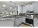 Beautiful kitchen featuring granite countertops, stainless steel appliances and ample cabinet space at 1025 Riverland Woods Pl # 609, Charleston, SC 29412