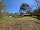 Expansive backyard with a large tree and plenty of space, offering great views at 1077 Harbor View Rd, Charleston, SC 29412