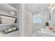 Bright bathroom with shelf space and storage, featuring a neutral color palette at 1077 Harbor View Rd, Charleston, SC 29412