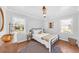 Bright bedroom featuring hardwood floors, neutral paint and ample light at 1077 Harbor View Rd, Charleston, SC 29412