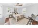 Stylish bedroom with neutral colors, modern decor, and ample natural light at 1077 Harbor View Rd, Charleston, SC 29412