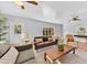 Cozy living room featuring hardwood floors, natural light, and comfortable seating at 1077 Harbor View Rd, Charleston, SC 29412