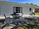 Outdoor patio with table and chairs, perfect for enjoying outdoor meals and fresh air at 1077 Harbor View Rd, Charleston, SC 29412