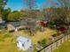 Aerial view of home with fenced yard, shed, patio, and mature trees in a neighborhood at 115 Clubhouse Rd, Summerville, SC 29483