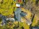 Aerial roof view of a house with a fenced yard, landscaping, and street access at 115 Clubhouse Rd, Summerville, SC 29483