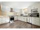 Modern kitchen featuring white cabinetry, stainless steel appliances, granite countertops, and stylish backsplash at 115 Clubhouse Rd, Summerville, SC 29483