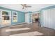 Bright sunroom with tile flooring, fan, double doors and lots of windows at 115 Clubhouse Rd, Summerville, SC 29483