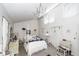 Airy bedroom showcasing high ceilings, window treatments, and unique decorative touches at 1158 Village Creek Ln # 3, Mount Pleasant, SC 29464