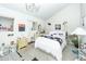 The bedroom is spacious and features large windows, vaulted ceiling and unique decor at 1158 Village Creek Ln # 3, Mount Pleasant, SC 29464