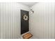 Cozy condo entrance with a charming welcome mat and a decorative wreath creating an inviting appeal at 1158 Village Creek Ln # 3, Mount Pleasant, SC 29464