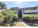 Condo building exterior shows a welcoming entrance with lush greenery enhancing the property's curb appeal at 1158 Village Creek Ln # 3, Mount Pleasant, SC 29464