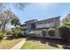 Charming condo exterior with a well-maintained lawn and landscaped greenery creating a welcoming ambiance at 1158 Village Creek Ln # 3, Mount Pleasant, SC 29464