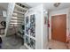 Inviting foyer with decorative cabinet, stairs, and a glimpse of the living space, radiating comfort and style at 1158 Village Creek Ln # 3, Mount Pleasant, SC 29464