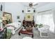Bright living room featuring a cozy seating area, fireplace, and large windows, perfect for relaxation at 1158 Village Creek Ln # 3, Mount Pleasant, SC 29464