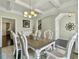 View of dining room with furniture, hardwood floors and decorative elements at 116 Rouen Ln, Summerville, SC 29486