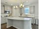 Beautiful kitchen with white quartz countertops, gray cabinets, stainless appliances, and subway tile backsplash at 116 Rouen Ln, Summerville, SC 29486