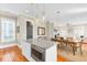 Kitchen island with granite countertops and stainless steel microwave at 1429 Lettered Olive Ln, Mount Pleasant, SC 29464