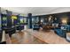 Luxurious basement showcasing multiple seating areas, a pool table, and elegant decor at 1456 Mcpherson Lndg, Johns Island, SC 29455
