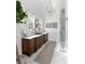 Luxurious bathroom with double vanity, marble countertop, and walk-in shower at 1456 Mcpherson Lndg, Johns Island, SC 29455