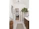 Bright bathroom with marble floors, ladder and access to a bedroom at 1456 Mcpherson Lndg, Johns Island, SC 29455
