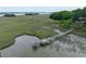 Picturesque walkway leading to a private dock on the water at 1456 Mcpherson Lndg, Johns Island, SC 29455