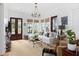 Bright living room with comfortable seating, large windows, and stylish decor at 1456 Mcpherson Lndg, Johns Island, SC 29455