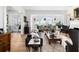 Bright living room with fireplace, hardwood floors and view of marsh at 1456 Mcpherson Lndg, Johns Island, SC 29455
