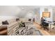 Bright living area with a comfortable sectional couch, glass coffee table, and stylish decor at 1456 Mcpherson Lndg, Johns Island, SC 29455