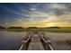 Marsh and water view from the pier, showcasing the natural beauty and peaceful setting at 1456 Mcpherson Lndg, Johns Island, SC 29455