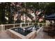 Beautiful pool and deck area featuring lounge chairs and outdoor dining with serene marsh views at 1456 Mcpherson Lndg, Johns Island, SC 29455