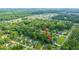 An aerial view of neighborhood homes surrounded by lush green trees and foliage at 1617 Southwick Dr, Johns Island, SC 29455