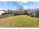 Large, well-maintained backyard, fenced in for privacy, offering ample space for recreation and outdoor activities at 1617 Southwick Dr, Johns Island, SC 29455