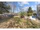 Expansive backyard featuring a well-maintained lawn, mature trees, and a cozy patio area perfect for relaxation at 1617 Southwick Dr, Johns Island, SC 29455