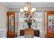 Dining room with a hutch in front of a sunny window with blinds at 1617 Southwick Dr, Johns Island, SC 29455