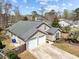 Charming home with a two-car garage, long driveway, and beautifully landscaped front yard at 1617 Southwick Dr, Johns Island, SC 29455