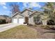 This home has a two-car garage, well maintained landscaping and a cozy exterior at 1617 Southwick Dr, Johns Island, SC 29455
