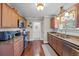 Well-equipped kitchen with stainless steel appliances, granite countertops, and hardwood floors at 1617 Southwick Dr, Johns Island, SC 29455