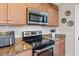 Well-equipped kitchen features stainless steel appliances and lovely granite countertops at 1617 Southwick Dr, Johns Island, SC 29455